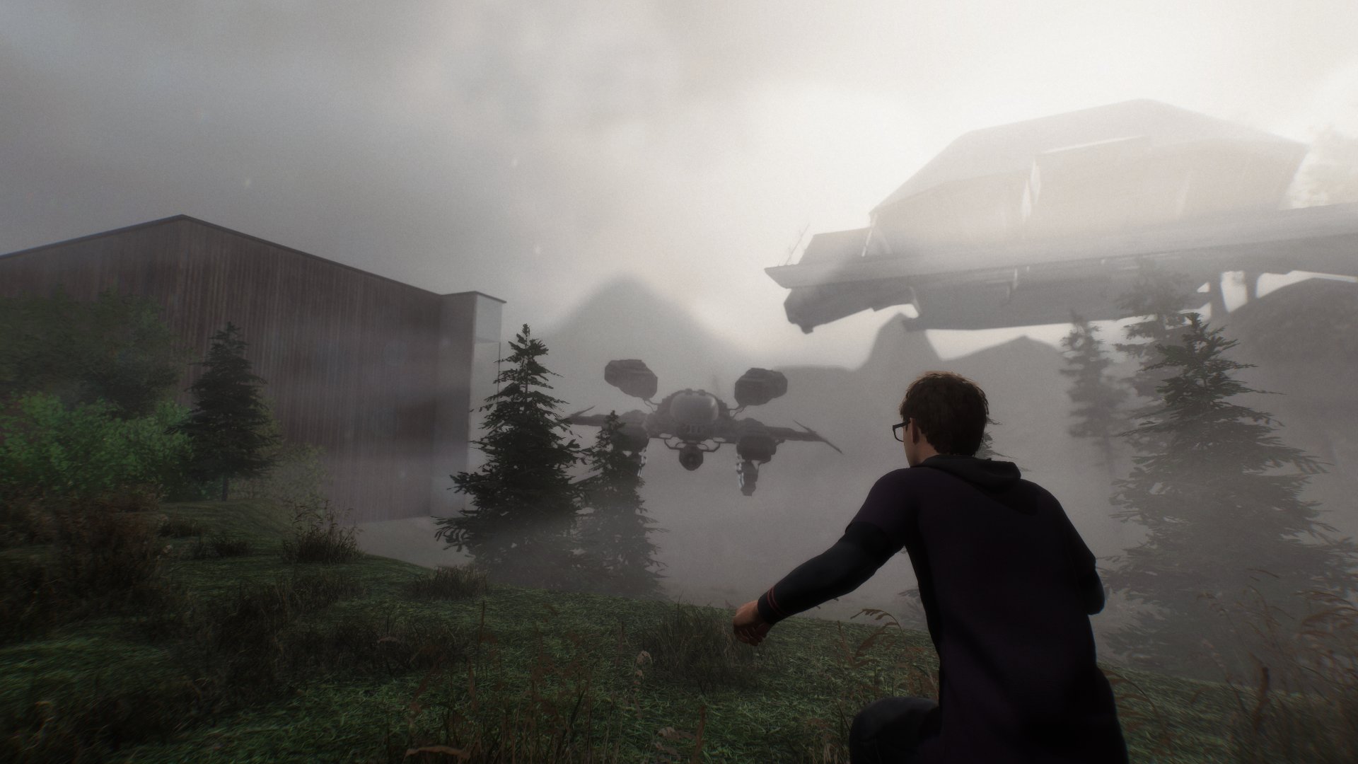 A craft descends through the fog